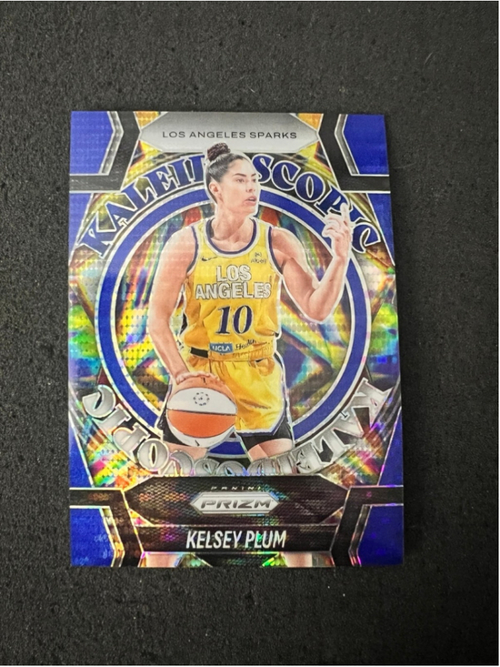 Panini Other - Kelsey Plum- 2025 Panini Prizm WNBA- Kaleidoscopic - Blue Pulsar Prizm #047/199